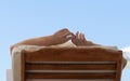 A personÃ¢â¬â¢s hands relaxing on Holiday Royalty Free Stock Photo